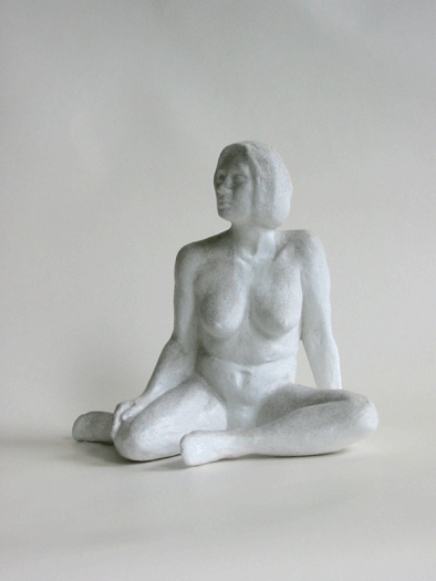 An animation of a realistic seated nude female resin sculpture.